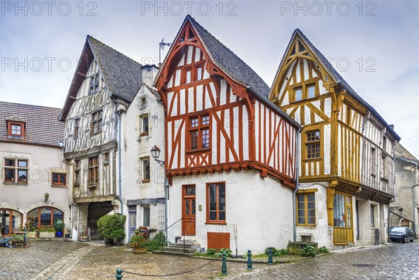Street with historical half-timbered houses in Noyers (Noyers-sur-Serein), Yonne, France, Europe