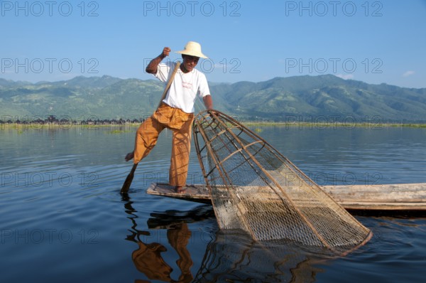 Inle Lake at 116 sq km (44.9 sq miles) is shallow, long, crystal clear and calm. Here the Intha people live, hemmed in on both sides by tall hills. The Intha men are famous for rowing standing up, using one leg, whilst fishing with tall, conical traps for Inle carp and the other, smaller fish with which the lake swarms.<br/><br/> The Intha women, champion market gardeners, use the fertile soil around the lake, as well as floating islands made of water hyacinths and mud, to grow cauliflower, tomatoes, cucumbers, cabbages, beans and aubergines. Inle is a simple place, but a place of plenty - both restful and sublime