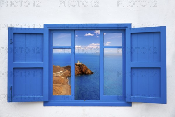 Almeria view from blue window of Cabo de Gata lighthouse photo mount