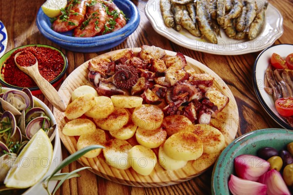 Tapas Pulpo a Feira with octopus potatoes gallega style and paprika recipe from Spain
