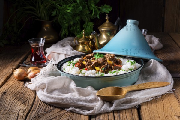 Tajin beef stew with rice, peppers and sesame seeds
