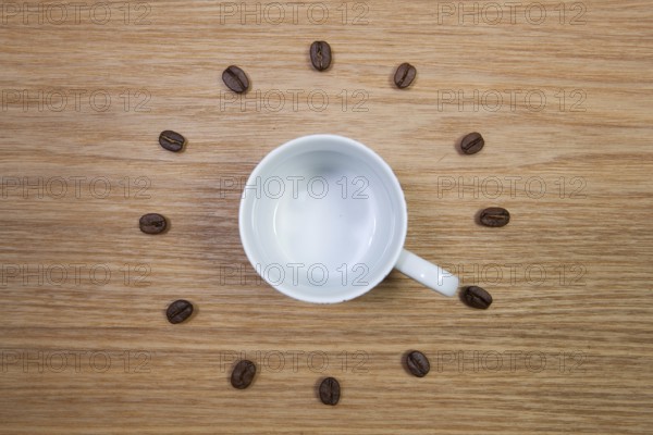 Coffee Time - Empty coffee cup and clock of coffee beans