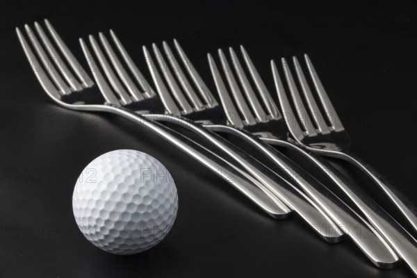 Forks on a black table