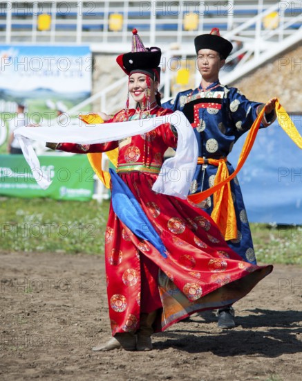 ULAN-UDE, RUSSIA - JULY 17: The 4th General Session of the World Mongolians Convention, July 17, 2010 in Ulan-Ude, Buryatia, Russia. Unidentified dancers open the event with a welcome dance