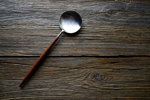 Kitchen tools spatule kitchenware on wooden background