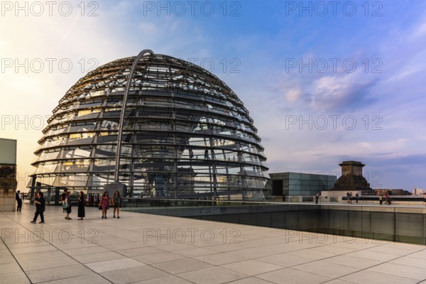 Berlin, Germany, July 28, 2019: View of the dome of Reichstag building, seat of the German Parliament. View at sunset, Europe