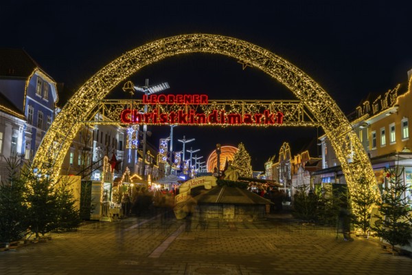 Archway, illuminated entrance to the Christmas market, night shot, main square of Leoben, Styria, Austria, Europe