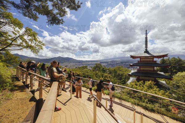 FUJIYOSHIDA CITY, JAPAN - SEPT 17TH, 2024: Arakura Fuji Sengen-jinja Shrine in Arakurayama Sengen Park on a hot autumn morning in Fujiyoshida City, Japan, Asia