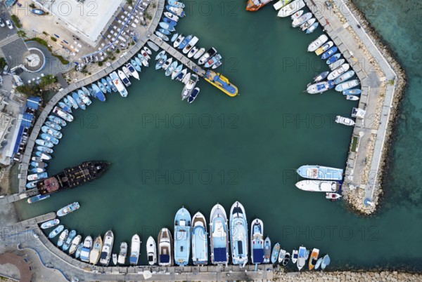 Aerial view of boats and yachts moored in a marina. Drone view from above. Ayia Napa Cyprus Europe