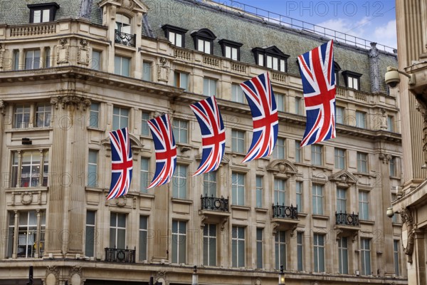 London UK flags in Oxford Street W1 Westminster England