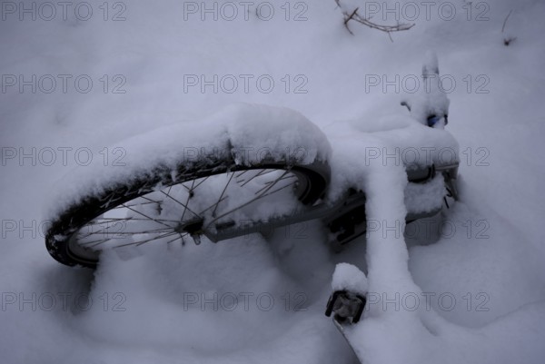 Germany, Berlin, 14.02.2025, Mauerpark, snow-covered bicycle, Europe