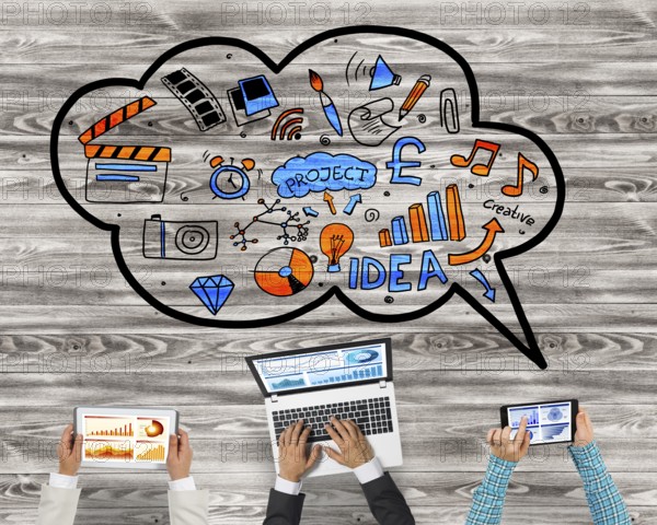 Group of people with devices in hands working together as symbol of networking and communication