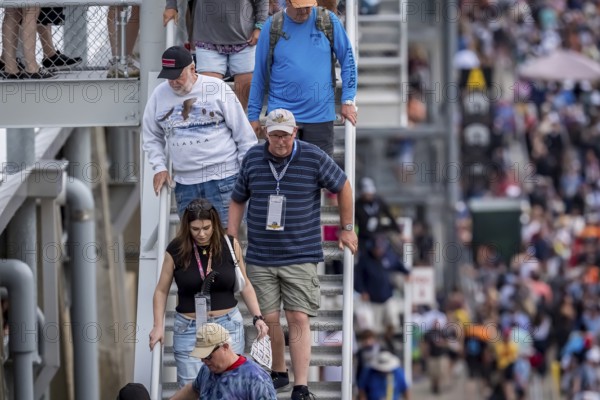 Fans depart the Indianapolis Motor Speedway after seeing JOSEF NEWGARDEN (2) of Nashville, Tennessee win the 108th Running of the Indianapolis 500 in Speedway, IN