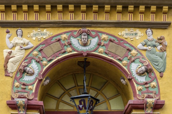 Detail of the coloured Renaissance entrance portal of the Alte Raths-Apotheke from 1598 in the medieval old town of Lüneburg, Hanseatic city of Lüneburg, Lower Saxony, Germany, Europe