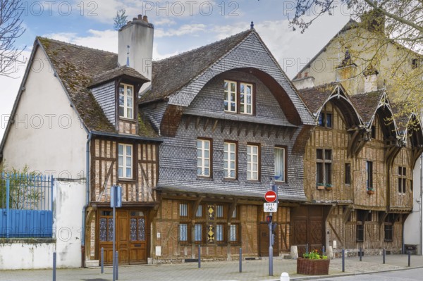 Street with historical half-timbered houses in Troyes, France, Europe