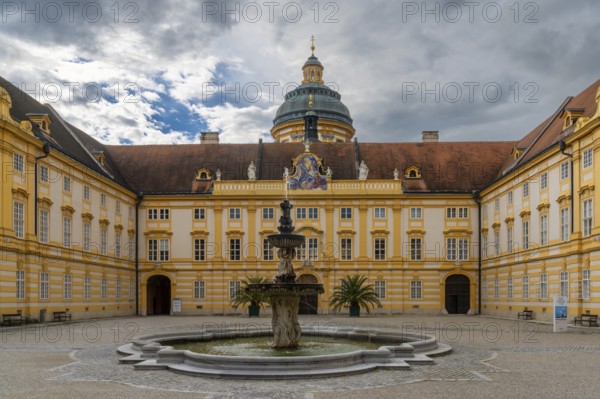 Melk, Austria, 22 September, 2022: view of the courtyard and fountain at the entrance of Melk Abbey in Lower Austria, Europe