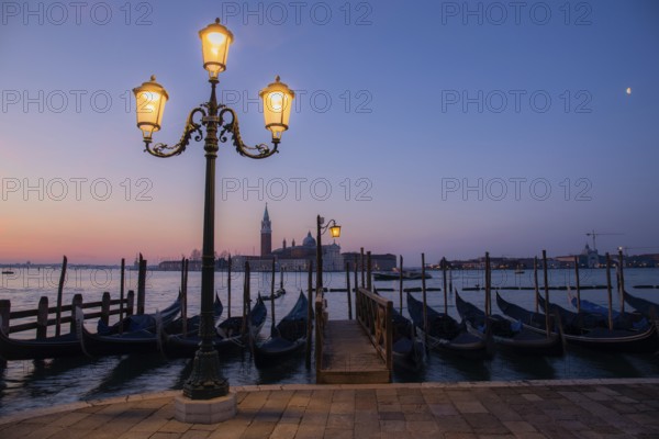 Dawn, Venetian gondolas with the church of San Giorgio Maggiore in the background, Venice, UNESCO World Heritage Site, Veneto, Italy, Europe