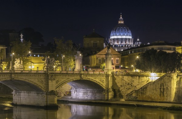View of Ponte Vittorio Emanuele II and St. Peter's Basilica in evening, Rome
