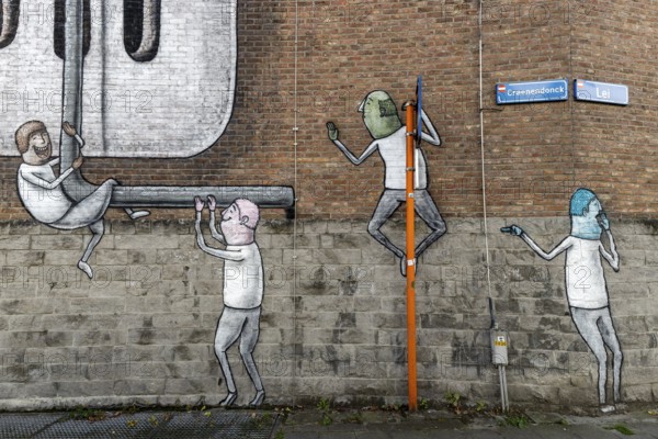 Large wall graffiti on the brick wall of buildings in Craenendonck Street, Leuven, Flanders, Flemish Brabant, Belgium, Europe
