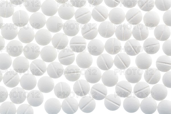 White tablets, symbolic photo for medicine, remedies and tablet addiction