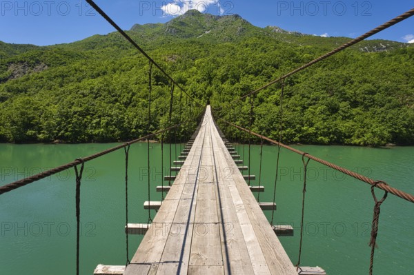 Shkopet lake with a mysterious bridge over the river leading to actually just some sheep tracks