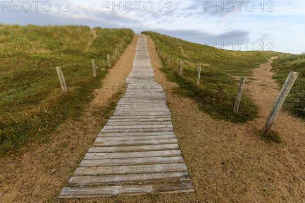 Wooden path at over sand dunes. Wooden path in the atlantic coast in France