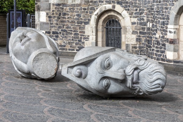 Heads of Bonn's patron saints Cassius and Florentus in front of Bonn Minster - Bonn, North Rhine-Westphalia, Germany, Europe