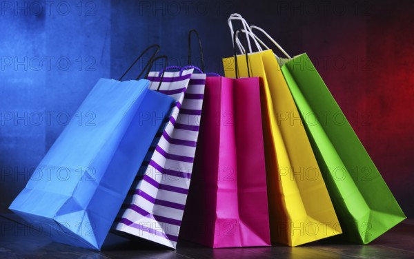 Composition with colorful paper shopping bags