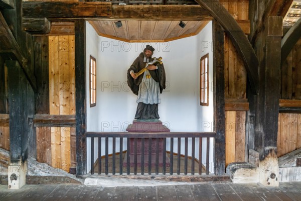 Germany - 4 July 2020: statue in the interior of the historic covered wooden bridge in Bad Saeckingen