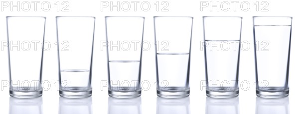 Six glasses with cold still water isolated on white background