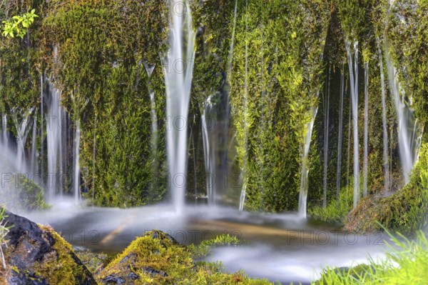 Detail of a small waterfall in the Gjain Valley in Iceland