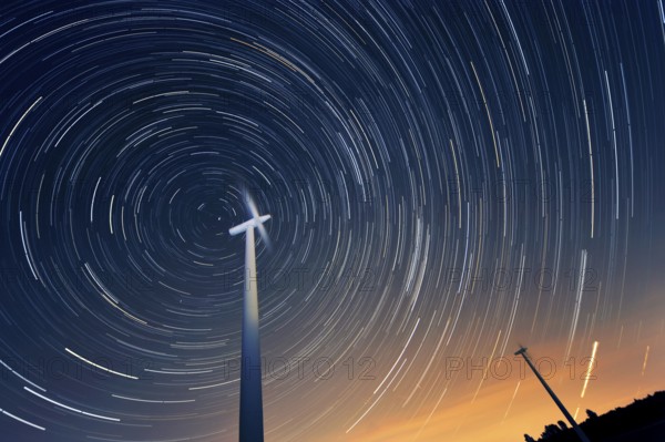 Wind turbines against the night sky