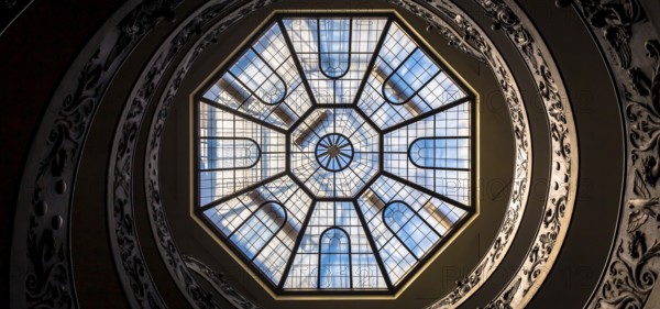 ROME, ITALY - CIRCA SEPTEMBER 2020: the famous spiral staircase with double helix made by Giuseppe Momo in 1932. Vatican Museum
