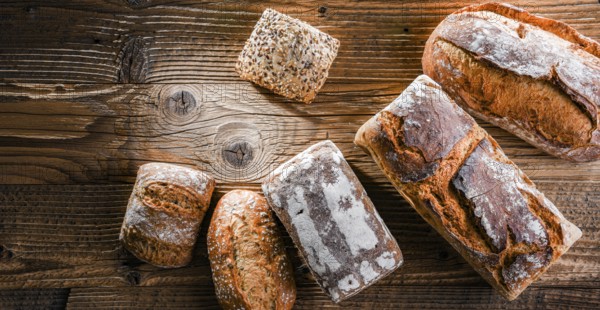 Composition with assorted bakery products on wooden table