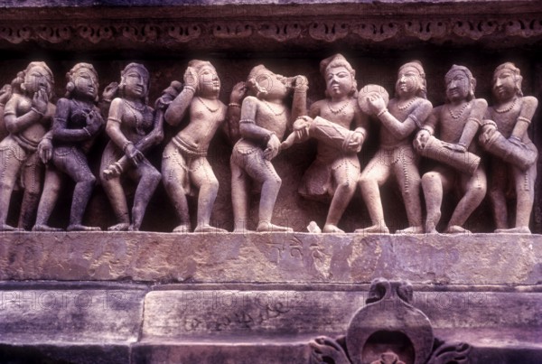 An erotic panel on the exterior wall of the Lakshmana temple in Khajuraho, Madhya Pradesh, India, Asia. World heritage site, Asia