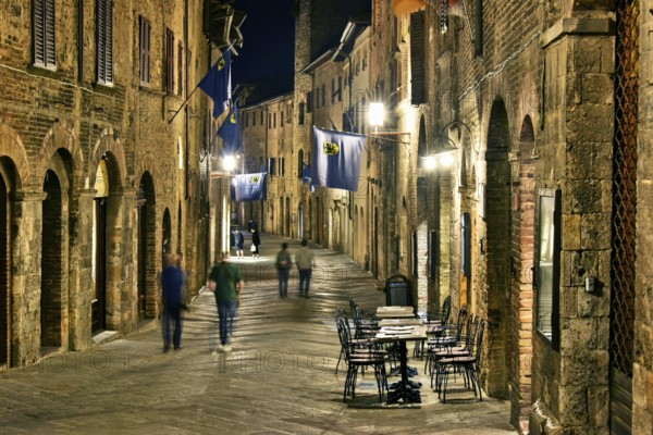 Street view of San Gimignano in Tuscany, Italy by night. UNESCO World Heritage Site