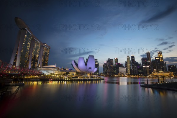 Marina Bay Sand area and Helix Bridge at dusk on a clear day on November 24th 2019
