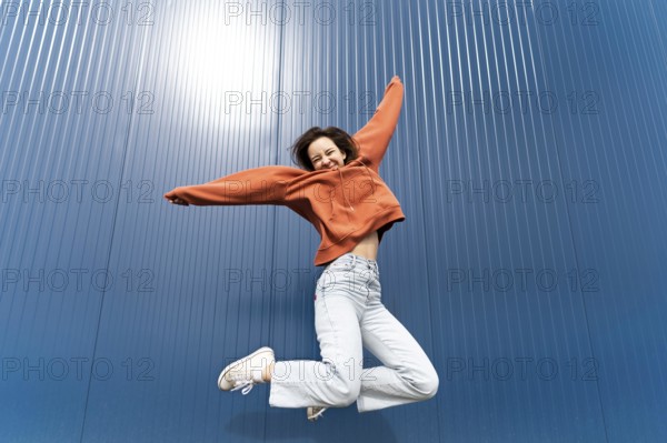 Portrait young woman jumping11