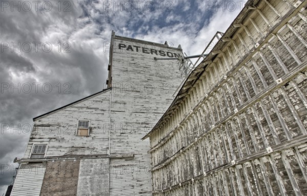 Prairie Grain Elevator in Saskatchewan Canada with storm clouds