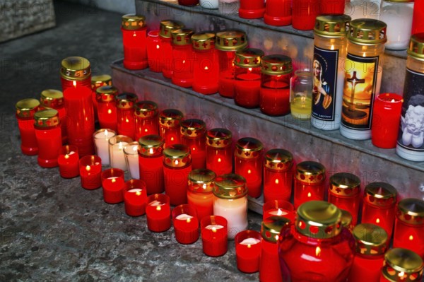 Many grave lights on All Saints' Day shine in a cemetery in Austria