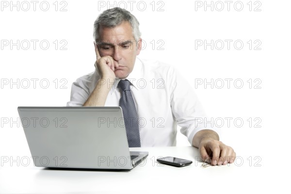 Businessman sad senior thinking laptop computer white background gray hair