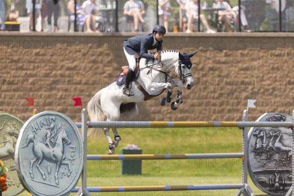 Daniel Bluman of Israel and riding Corbie V.V., compete in the 1.60m Grand Prix during The Continental international competition at Spruce Meadows, in Calgary, Canada, North America