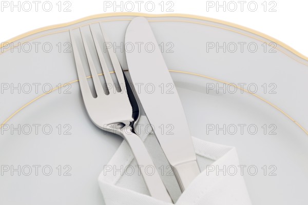A knife with fork and plate. Place setting for a dinner in a restaurant. Austria