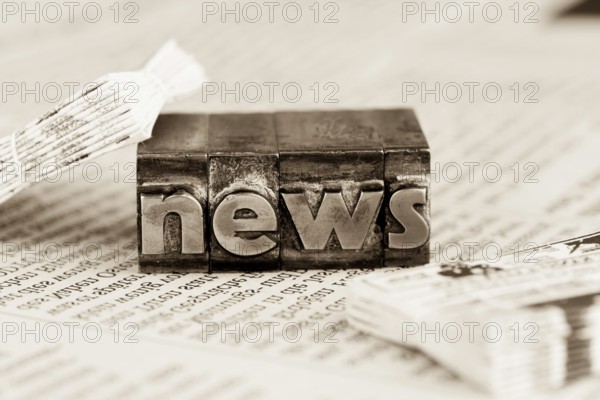 The word News was written in lead letters. Symbol photo for newsletters, newspapers and Information Austria