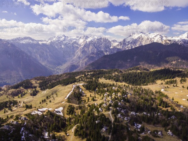 Velika Planina Alpine Meadow, drone photo of beautiful nature on a sunny day