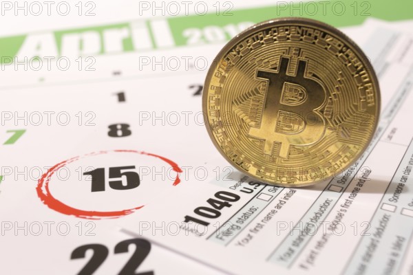 2019 calendar with 1040 income tax form for 2018 showing tax day for filing on April 15