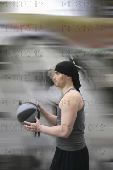 Active motion street basket player ball blur background