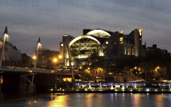 Charing Cross waterfront at dusk and Hungerford Bridge, London, England London, England