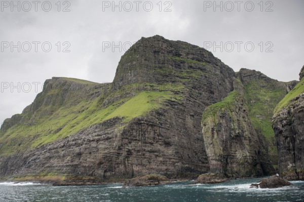 Landscape on the Faroe Islands with ocean and cliffs close to Vestmanna on Streymoy, Faroe Islands, Europe