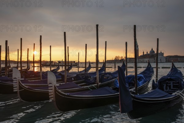 Morning atmosphere at sunrise, gondola jetty, San Giorgio Maggiore church behind, Venice, Veneto, Italy, Europe